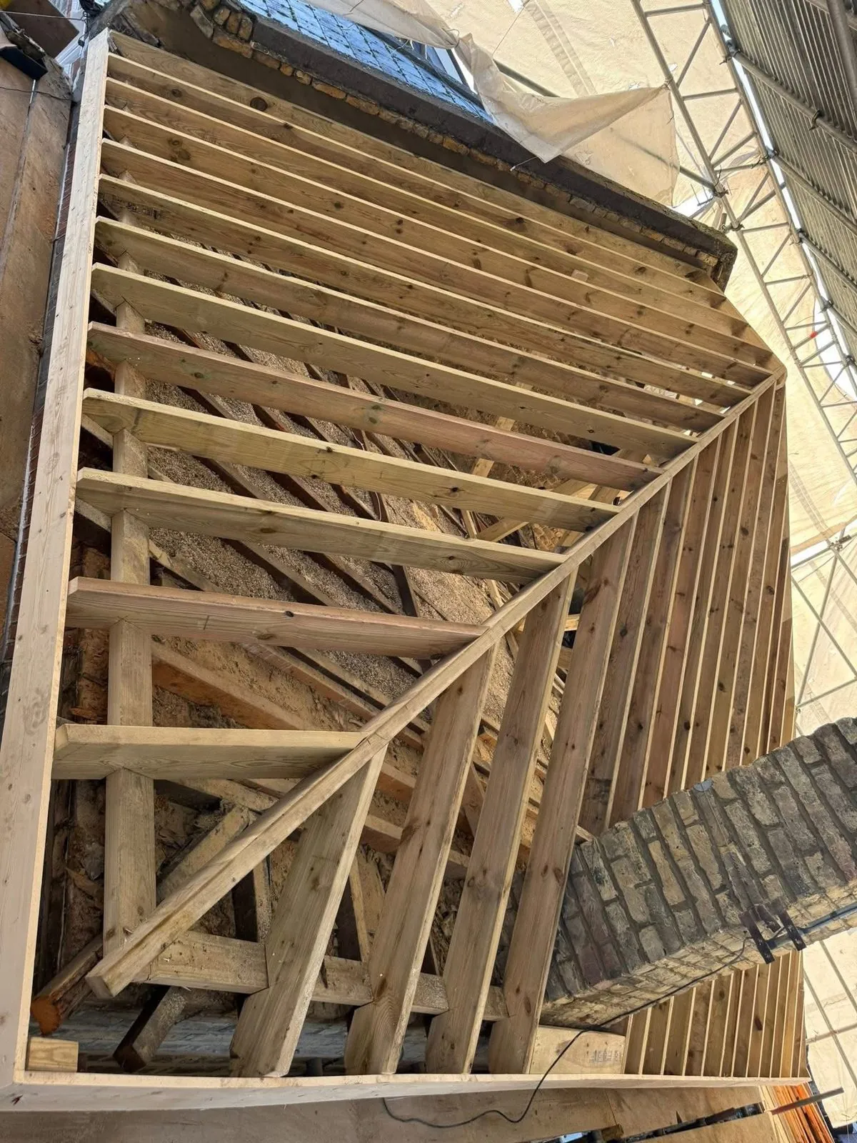 New roof timbers and rafters during a re-roof in Looe